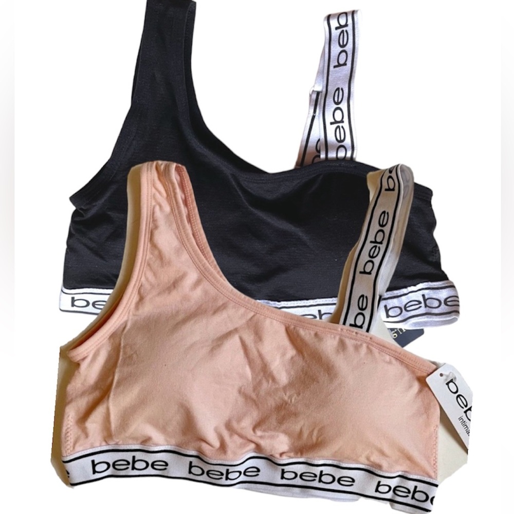 NWT 2 pc Bebe bras one shoulder logo style.